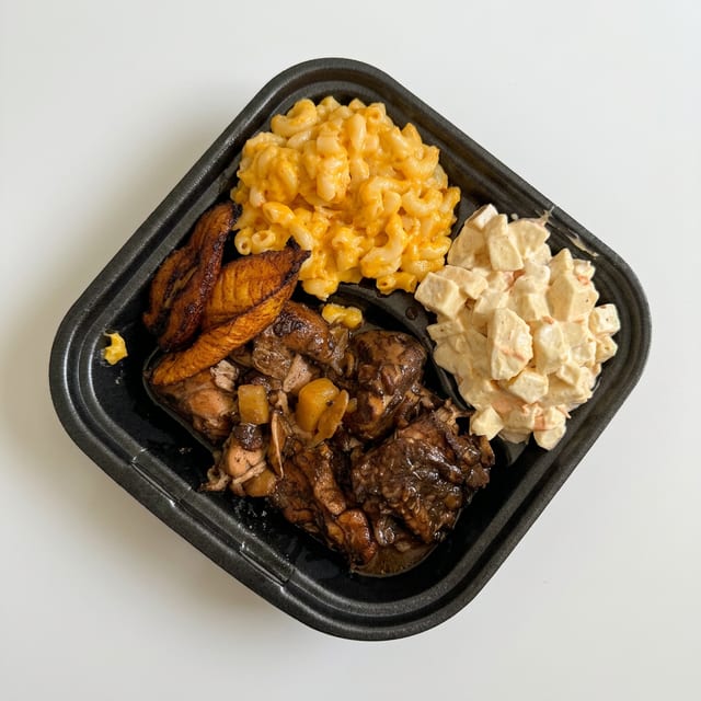 Brown Stew Chicken Meal.
